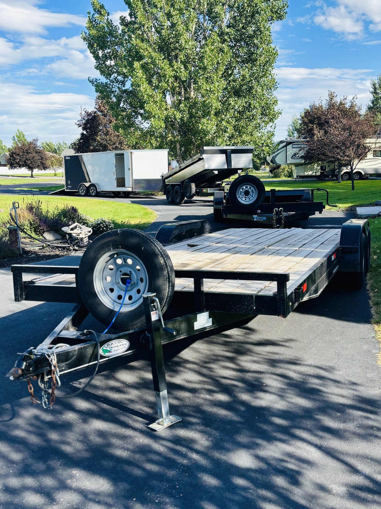 Teton Trailer Rentals fleet — car hauler, dump and enclosed cargo trailers in Rigby, Idaho